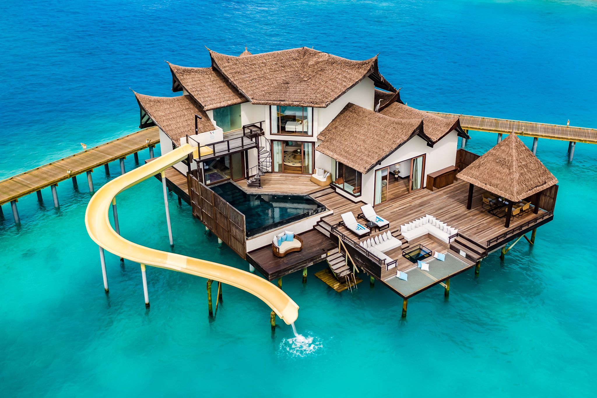 OZEN_Reserve_Bolifushi_Accommodation_Villas_Ocean_Pool_RESERVE_Sunset_with_Slide_2_BR_Aerial