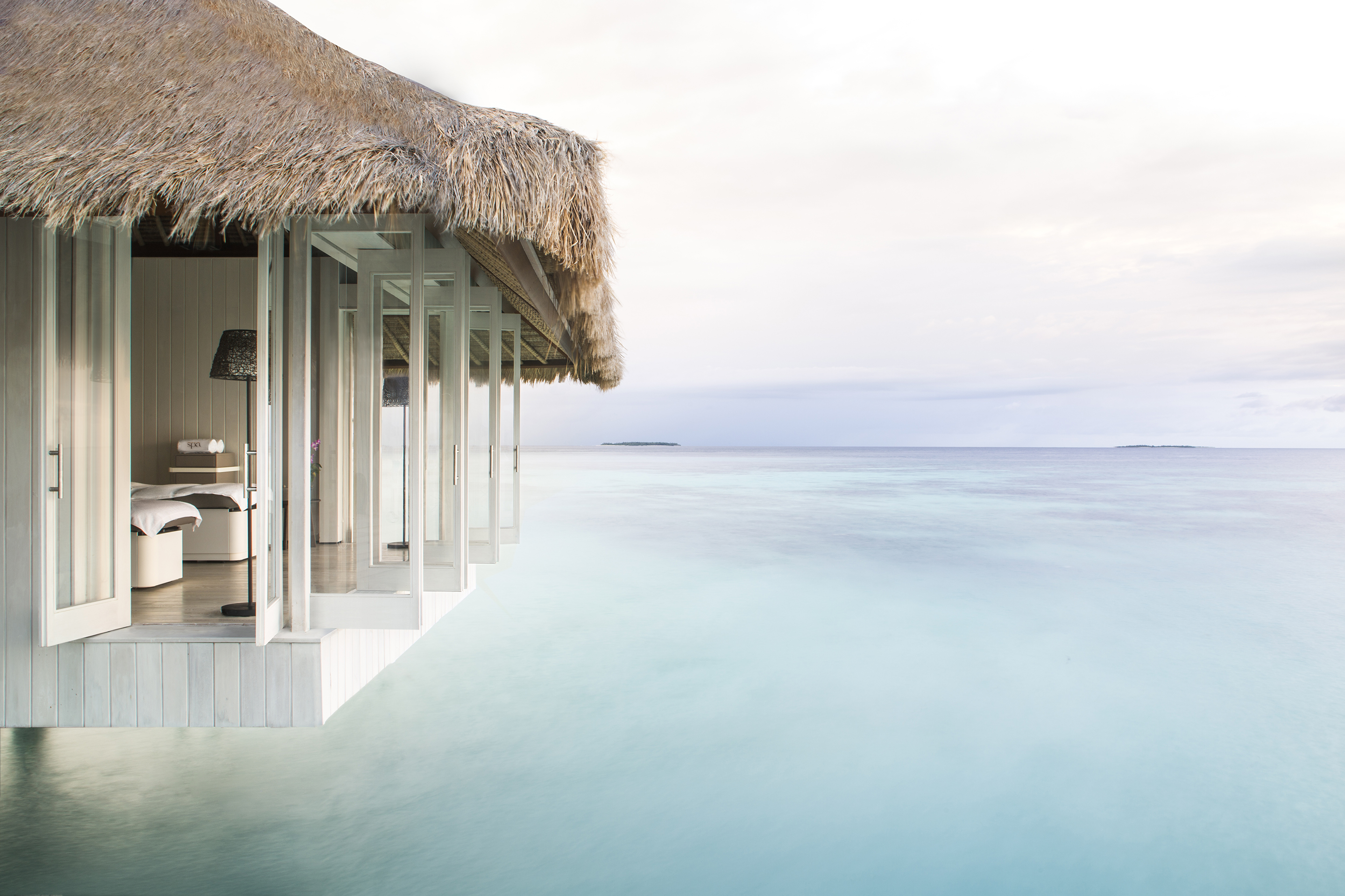 Overwater villas at sunset